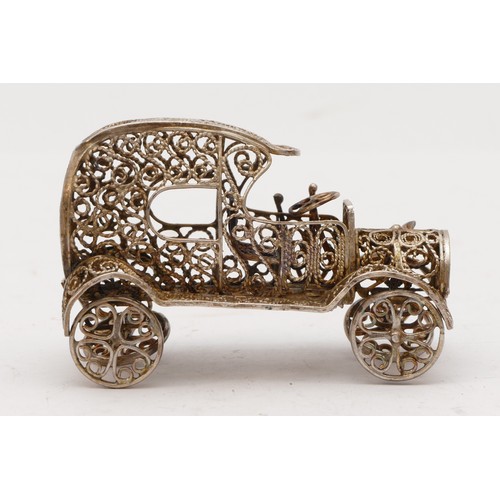 70 - A 925 silver filigree model of a motor car, length 6.5cm, 41gm