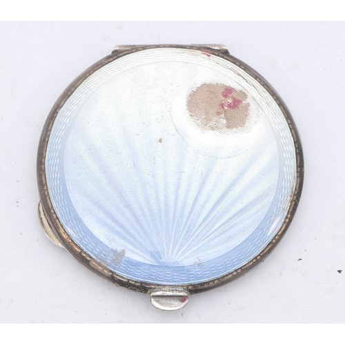 97 - A sterling silver and enamel compact, dated 1942, 72mm, as found