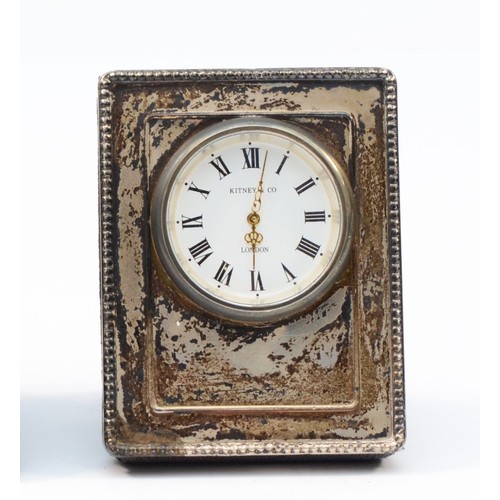 104 - A silver mounted quartz desk clock, London 1993, 6.5 x 5cm.