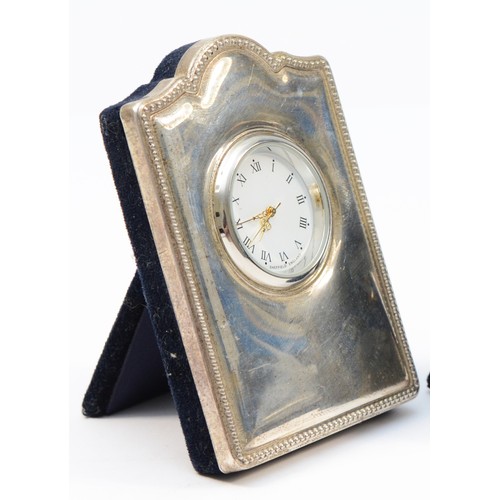 105 - A silver mounted quartz desk clock, Sheffield 2012, 9 x 6cm.