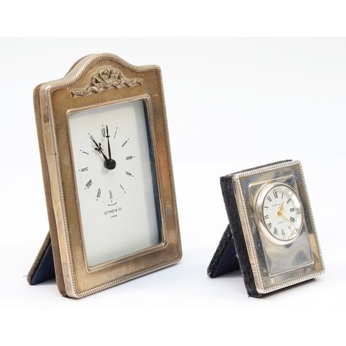 106 - A silver mounted quartz desk clock, London 1993, 12.5 x 9cm and another London 1998, 6.5 x 5cm.