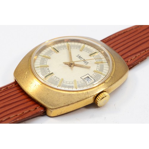 115 - Smiths, a gold plated manual wind date gentleman's wristwatch, case 12193-13802, textured case, 36 x... 