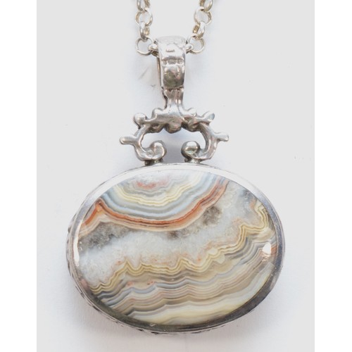 180 - A silver and agate set pendant, stone28 x 22mm, chain, 21gm