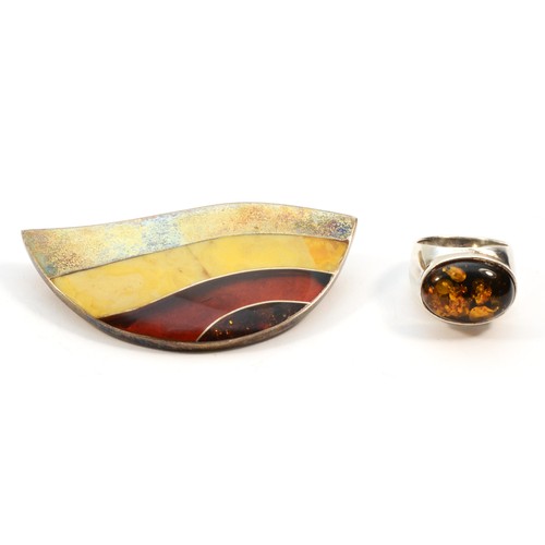 182 - A silver and banded amber brooch, 64mm and an amber set silver ring, 24gm