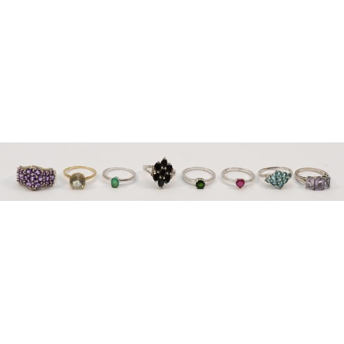 194 - A silver set single stone emerald ring and seven other gemset silver rings, 30gm