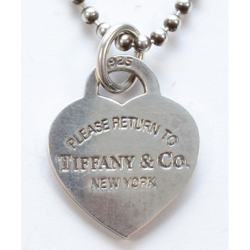 201 - Tiffany & Co. a silver heart shape pendant on ball link chain, 60cm, 17gm