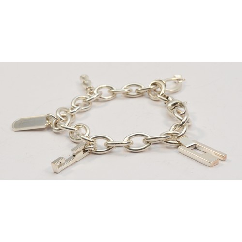 202 - Gucci, a silver charm bracelet, 20cm, 45gm