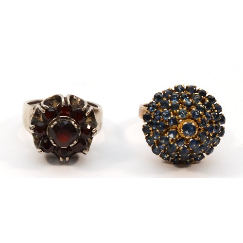 211 - A silver gilt and sapphire bombe cluster ring and a silver and garnet cluster ring, 15gm