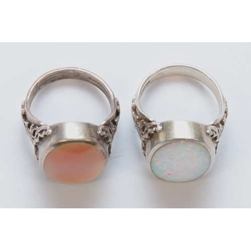 214 - David Scott Walker, Sheffield, a silver opal mounted dress ring, stone 21 x 14mmR and another by the... 