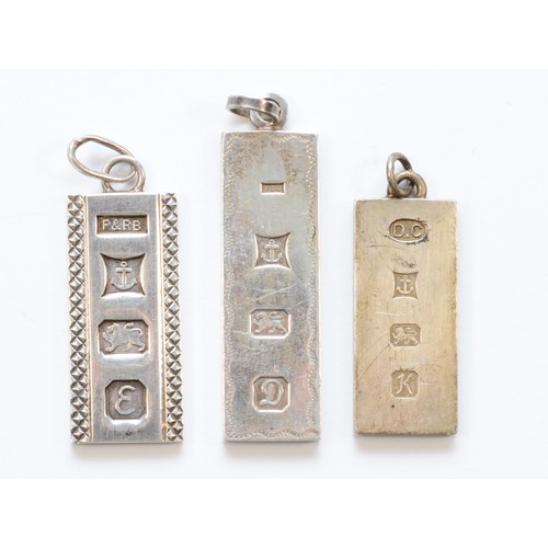 218 - Three silver ingot pendants, the largest 45mm, 41gm