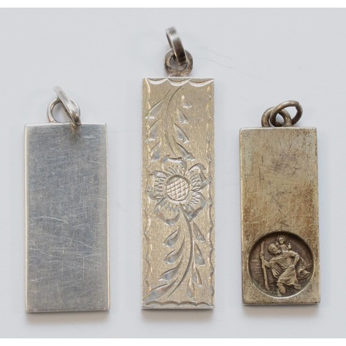 218 - Three silver ingot pendants, the largest 45mm, 41gm