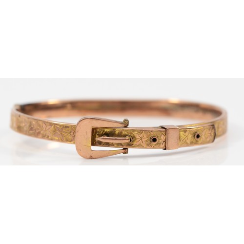 236 - An Edwardian 9ct rose gold buckle bangle, 57 x 48mm, repair to back, 6.2gm