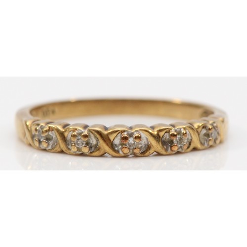 239 - A 9ct gold diamond set five stone half eternity ring, P, 1.8g