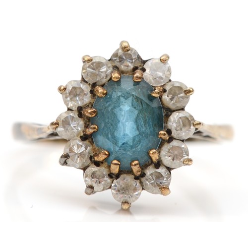 243 - A 9ct gold blue topaz and cubic zirconia set cluster ring, N, 2.4g