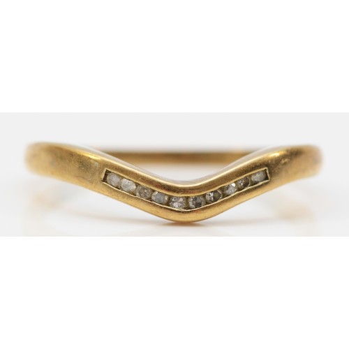 245 - A 9ct gold diamond set wishbone chevron band ring, O, 1.5g