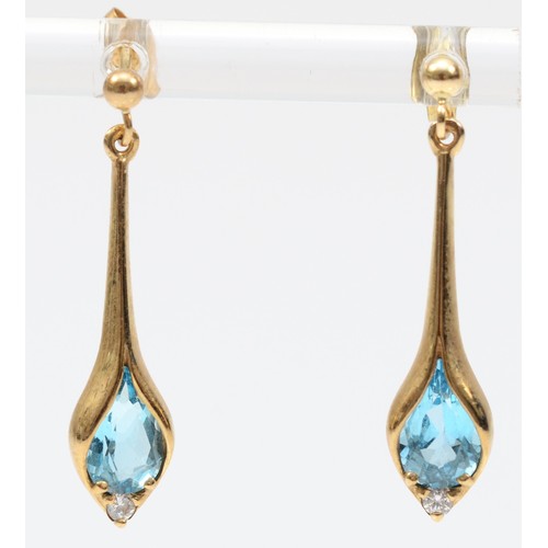 251 - A pair of 9ct gold blue topaz and cubic zirconia drop earrings with scroll backs, 25mm drop, 2.1g