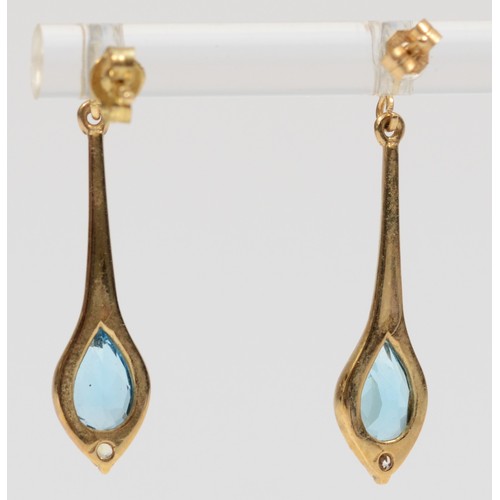 251 - A pair of 9ct gold blue topaz and cubic zirconia drop earrings with scroll backs, 25mm drop, 2.1g