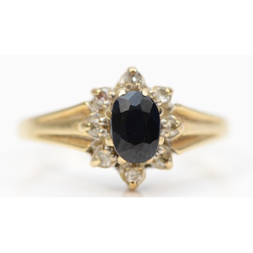 256 - A 9ct gold vintage sapphire and diamond cluster ring, K, 1.7g