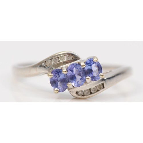 267 - A 9ct gold tanzanite and diamond dress ring, U, 2.3g