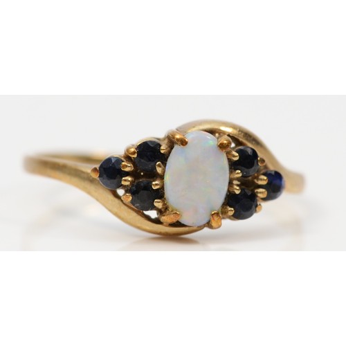 269 - A 9ct gold vintage opal and sapphire dress ring, K 1/2, 1.2g