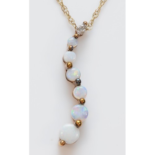 272 - A 9ct gold graduated opal pendant with necklace, 25mm length, 1.7g