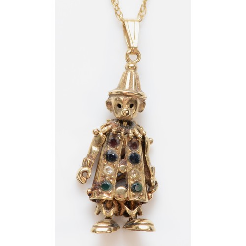 275 - A 9ct gold sapphire, garnet, cubic zirconia and green gemstone set articulated clown pendant, with n... 