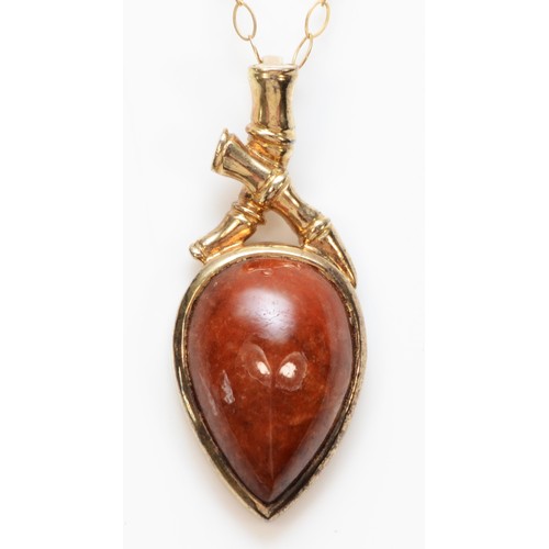 276 - A 9ct gold jasper pendant, bezel set, with necklace, 25mm pendant length, 2.6g