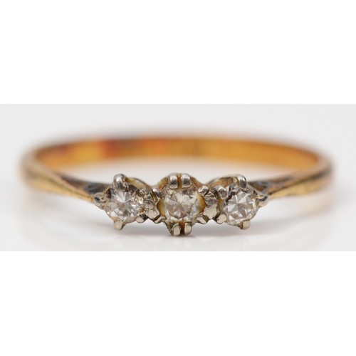 281 - An 18ct gold and platinum vintage diamond three stone ring, R, 2g