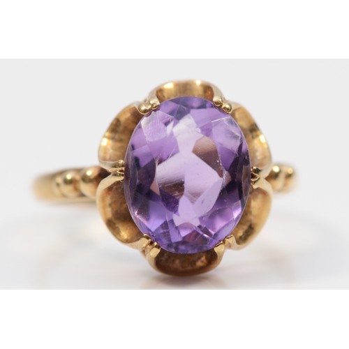 284 - A 9ct gold vintage amethyst dress ring, Birmingham 1972, J 1/2, 2.5g