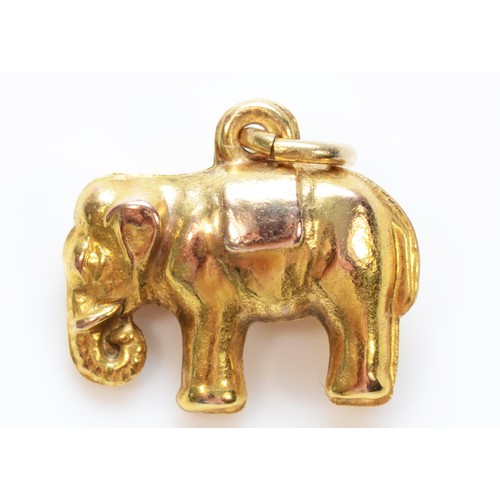 290 - A 9ct gold elephant charm, Birmingham 1977, 13mm across, 0.6g