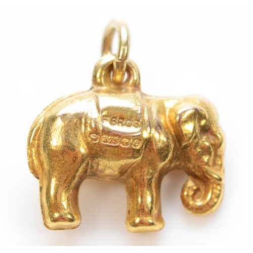 290 - A 9ct gold elephant charm, Birmingham 1977, 13mm across, 0.6g