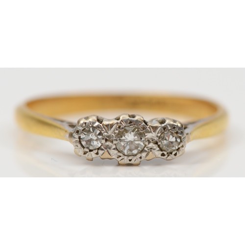 297 - An 18ct gold and platinum vintage diamond three stone ring, N 1/2, 2.2g