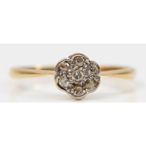 301 - An 18ct gold vintage diamond cluster ring, K 1/2, 1.3g