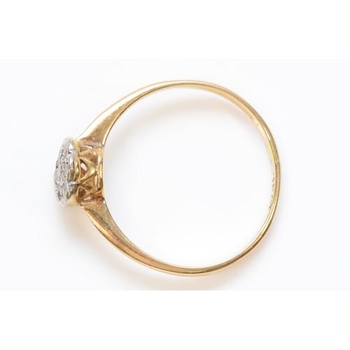 301 - An 18ct gold vintage diamond cluster ring, K 1/2, 1.3g