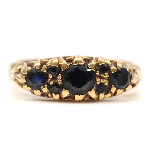 303 - A 9ct gold vintage sapphire dress ring, L 1/2, 2.1g