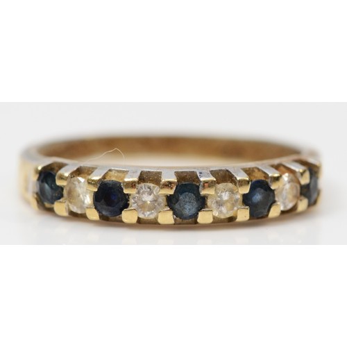 314 - An 18ct gold sapphire and diamond half eternity ring, K, 2.3g