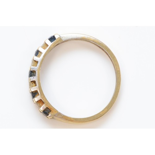 314 - An 18ct gold sapphire and diamond half eternity ring, K, 2.3g