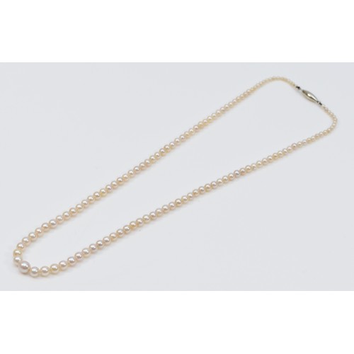 342 - A 9ct gold graduated cultured pearl necklace, largest pearl is 4mm, 8.4g