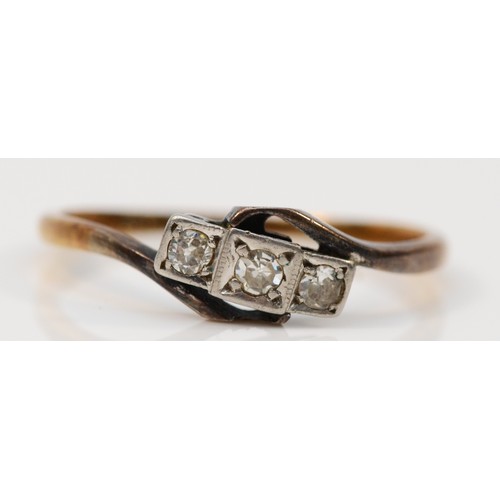 345 - An 18ct gold and platinum vintage diamond three stone ring, L 1/2, 1.5g