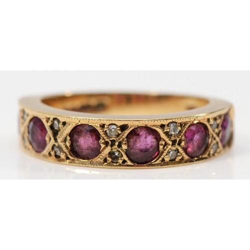 357 - A 9ct gold vintage diamond and ruby dress ring, London 1979, L, 3.8g