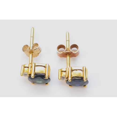 361 - A pair of 14k gold sapphire and cubic zirconia stud earrings with 9ct gold scroll backs, 1.8g