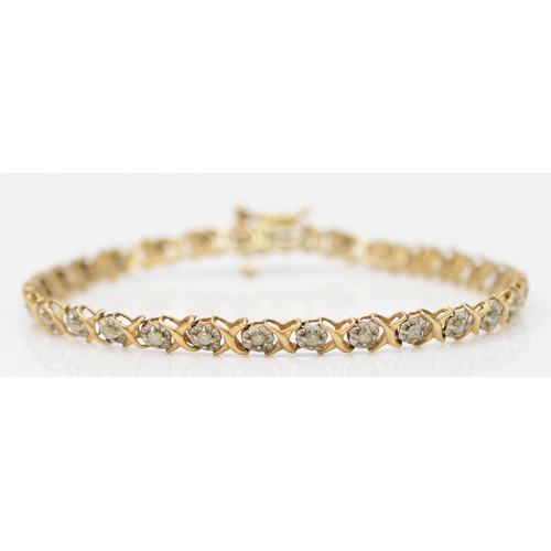 364 - A 9ct gold diamond bracelet, 18cm, 5.1g