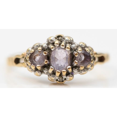 373 - A 9ct gold vintage amethyst and diamond dress ring, claw set, N 1/2, 2g