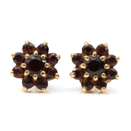 379 - A pair of 9ct gold garnet cluster earrings with scroll backs, 10mm diameter, 2.7g