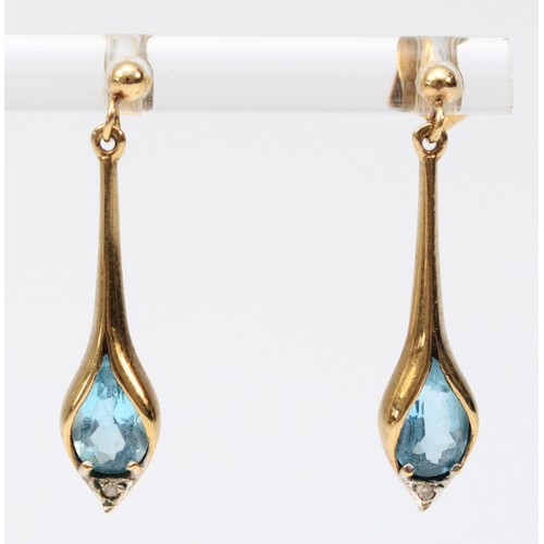 386 - A pair of 9ct gold blue topaz and diamond drop earrings with scroll backs, 25mm drop, 2g