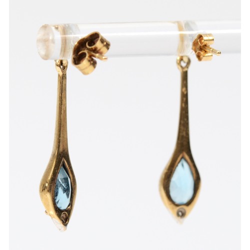 386 - A pair of 9ct gold blue topaz and diamond drop earrings with scroll backs, 25mm drop, 2g