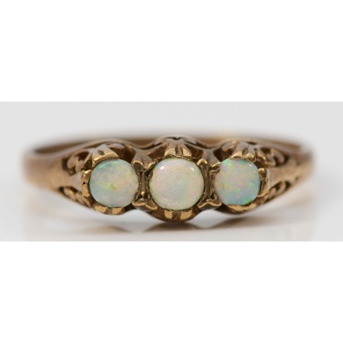 402 - A 9ct gold vintage opal three stone ring with patterned gallery, N, 1.8g