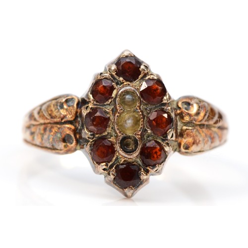 407 - A 9ct gold antique garnet and seed pearl dress ring with patterned shoulders, one setting vacant, P,... 