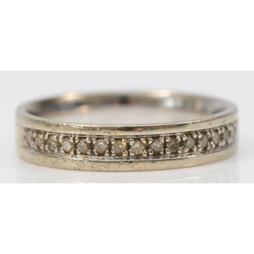 408 - A 9ct white gold diamond half eternity ring, textured finish, N, 2.9g