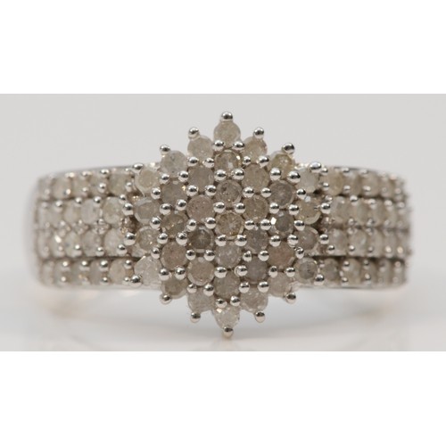 565 - A 9ct white gold pave set diamond dress ring, P 1/2, 3.8g